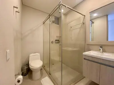 a bathroom with a shower and a toilet and a sink at MQ 1006 Cartagena, Playa cercana in Cartagena de Indias