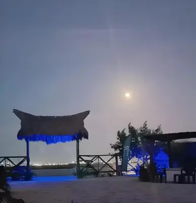 a stage with a moon in the sky at casa de vacaciones tierra bomba cartagena de indias in Tierra Bomba