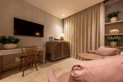 a living room with a couch and a table at Cinco Quintas Hotel Boutique in Cartagena de Indias