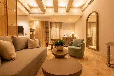 a living room with a couch and a table at Cinco Quintas Hotel Boutique in Cartagena de Indias