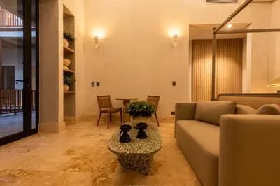 a living room with a couch and a table at Cinco Quintas Hotel Boutique in Cartagena de Indias