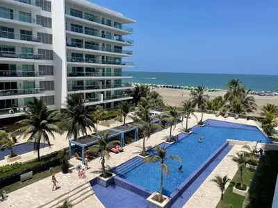 an aerial view of a resort swimming pool with a beach at Apartamento de lujo Morros ULTRA con vista y acceso directo al mar , Cartagena de Indias in Cartagena de Indias