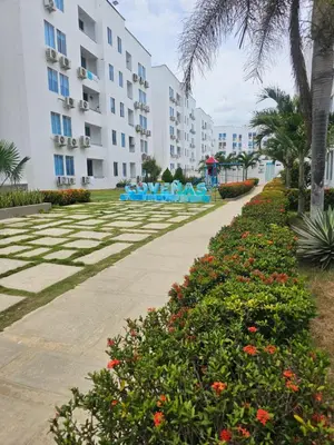 a walkway in front of a apartment building at Paraiso Coveñas, Unidad con la mejor piscina in Coveñas