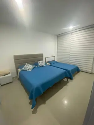 a bedroom with two beds in a room at Apartamento completo vacacional in Cartagena de Indias