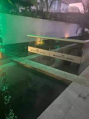 a bench with words on it next to a body of water at Apartamento completo vacacional in Cartagena de Indias