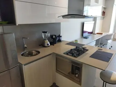 a kitchen with a counter top with a blender at Distrito 90 in Barranquilla