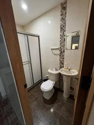a bathroom with a toilet and a sink at Apartamento la Isla 2-Coveñas in Coveñas