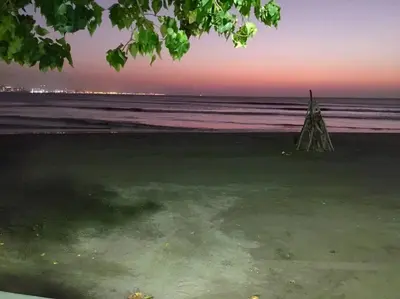 a body of water with a beach with the horizon at dhozt Marlinda Beach House. Cartagena Colombia in Cartagena de Indias
