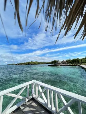 a view of the water from a boat in the ocean at Tintipan Hotel in Tintipan Island