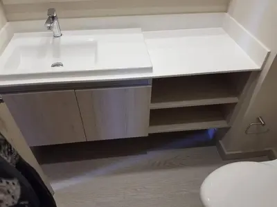 a bathroom with a white sink and a toilet at Apartamento en edificio con espectacular terraza in Cartagena de Indias