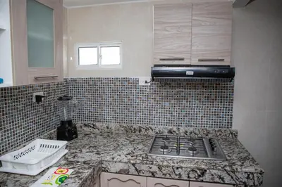 a kitchen with a counter top with a stove at CASA PETRA in Cartagena de Indias