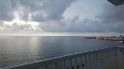 a view of the water from the balcony of a building at Apto en Cartagena de Indias in Cartagena de Indias