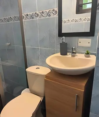 a bathroom with a toilet and a sink at Céntrico y confortable apto Casa Doña Yola 4 in Cartagena de Indias