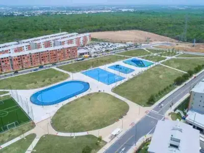 an aerial view of an apartment complex with four pools at REFUGIO URBANO - Apartamento para descanso y trabajo remoto en Alameda del Río Barranquilla in Barranquilla