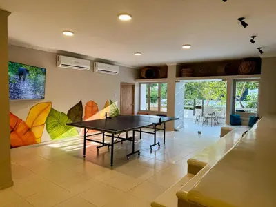 a dining room with a ping pong table in it at Hostel Dorado Plaza Getsemaní in Cartagena de Indias