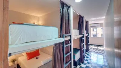a couple of bunk beds in a room at Hostel Dorado Plaza Getsemaní in Cartagena de Indias