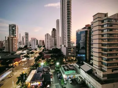 a city skyline with tall buildings and a street at BARLOVENTO in Cartagena de Indias