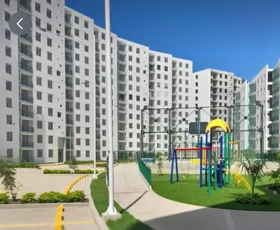 a playground in front of a large apartment building at Habitación Disponible en Cartagena cerca a la terminal de transporte in Cartagena de Indias