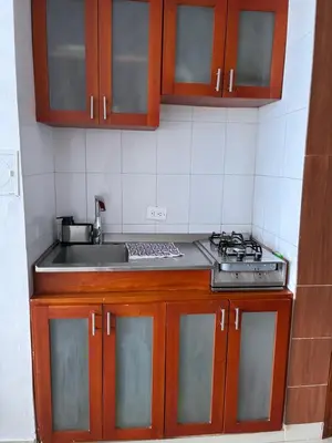 a kitchen with a sink and a stove at Fabuloso estudio con vista al laguito in Cartagena de Indias