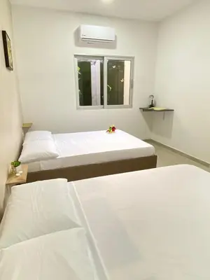 a hospital room with two beds and a window at Guakmaya hostel in Cartagena de Indias