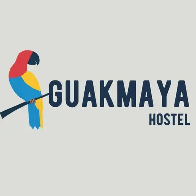 a colorful bird sitting on a branch with the text guayaquil hostel at Guakmaya hostel in Cartagena de Indias