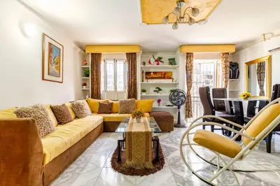 a living room with a couch and a table at Apartamento en Centro Histórico De Cartagena in Cartagena de Indias