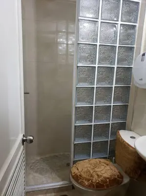 a bathroom with a shower with a toilet and a sink at Apartamento en Centro Histórico De Cartagena in Cartagena de Indias