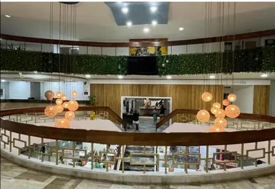 a lobby with orange lights in a building at El Conquistador in Cartagena de Indias