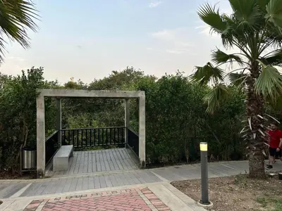 a pavilion with a bench and a palm tree at LUXURY APARTAMENT, MORROS ECO VISTA AL MAR. in Cartagena de Indias