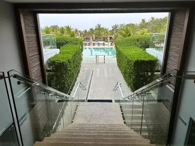 a stairway leading to a pool in a building at LUXURY APARTAMENT, MORROS ECO VISTA AL MAR. in Cartagena de Indias