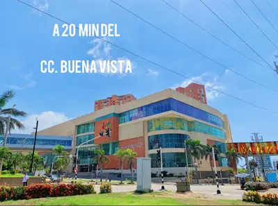 a building with a sign that reads ccu buena vista at Moderno apto low cost 15 min CC buena vista 2 TV con parqueadero comunal in Barranquilla
