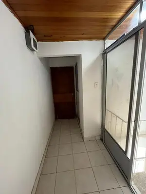 an empty room with a door and a window at Apartamento VIVAMAR Manantial in Cartagena de Indias