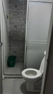 a bathroom with a toilet and a shower at Apartamento VIVAMAR Manantial in Cartagena de Indias