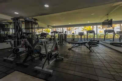 a gym with several treadmills and cardio machines at Condominio frente al mar con acceso directo a la playa Morros Ultra in Cartagena de Indias