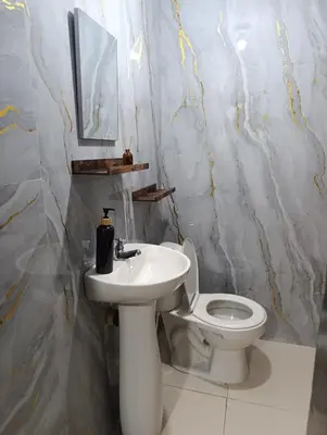 a bathroom with a sink and a toilet at Casa perla in Cartagena de Indias