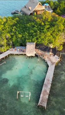 an aerial view of a resort in the water at El Arca in Tintipan Island