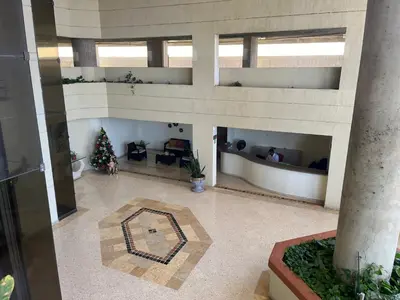 a living room with a christmas tree in a building at Cabrero, cerca de la Ciudad Amurallada y playa in Cartagena de Indias