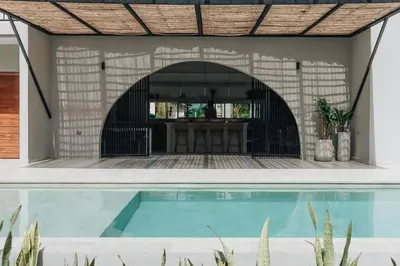 an external view of a house with a swimming pool at Gaia Casa de Mar in El Bobo
