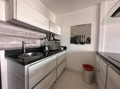 a kitchen with a sink and a counter top at Prime Location: Fully Equipped Loft in El Laguito in Cartagena de Indias