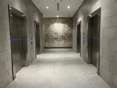 an empty hallway with elevators in a building at by Calamari Homes - Infinitum 3302 Bocagrande in Cartagena de Indias