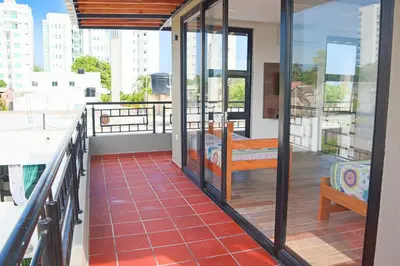 a balcony with a view of a city at CABAÑA PLAYA MAR in Coveñas
