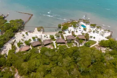 an aerial view of an island in the water at ACASI Rustic Beach in Baru