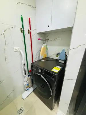 a kitchen with a washing machine in a room at Nice Apartment close to Historic City and beach in Cartagena de Indias