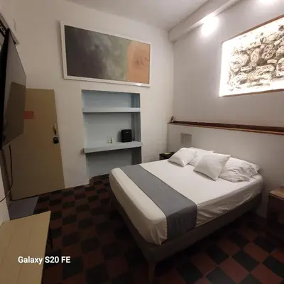a bedroom with a bed in a room at Casa Zaguan in Cartagena de Indias