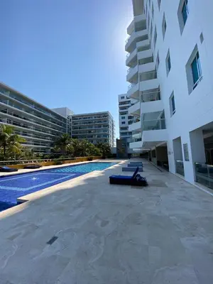 a swimming pool in the middle of a building at Apartamento playa Morros, La boquilla, Cartagena de indias in Cartagena de Indias