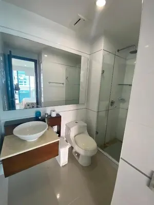 a bathroom with a sink and a toilet and a shower at Apartamento playa Morros, La boquilla, Cartagena de indias in Cartagena de Indias