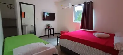 a bedroom with a bed and a window at Hotel Boutique Chateau de la Mar in Juan de Acosta
