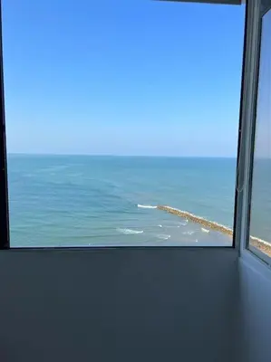 a view of the ocean from a window in an airplane at 360° Sea View Penthouse 17° floor, Cartagena in Cartagena de Indias