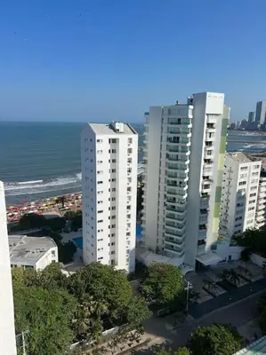 a group of tall white buildings next to the ocean at 360° Sea View Penthouse 17° floor, Cartagena in Cartagena de Indias