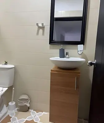 a bathroom with a sink and a mirror at Céntrico y confortable apto Casa Doña yola 7 in Cartagena de Indias